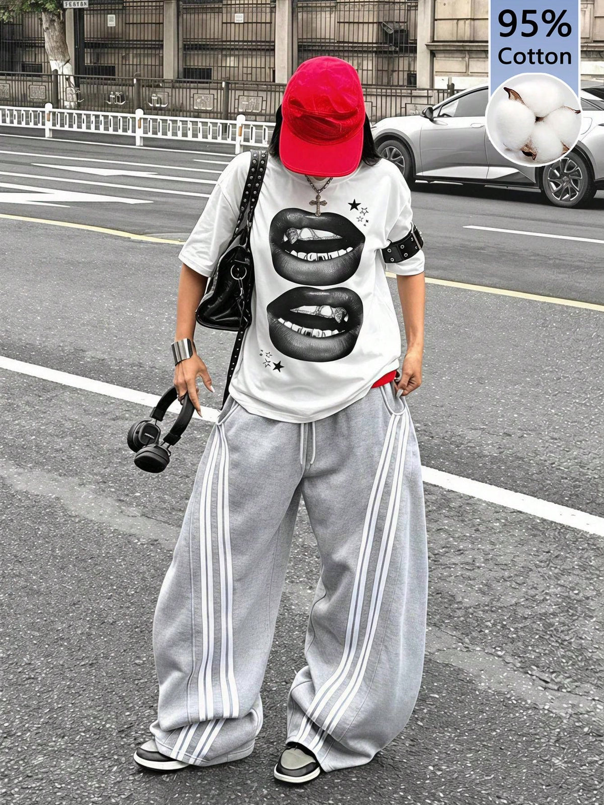 Unisex oversized grey graphic t-shirt featuring drop shoulder half sleeves, a round neckline, and a relaxed loose fit.