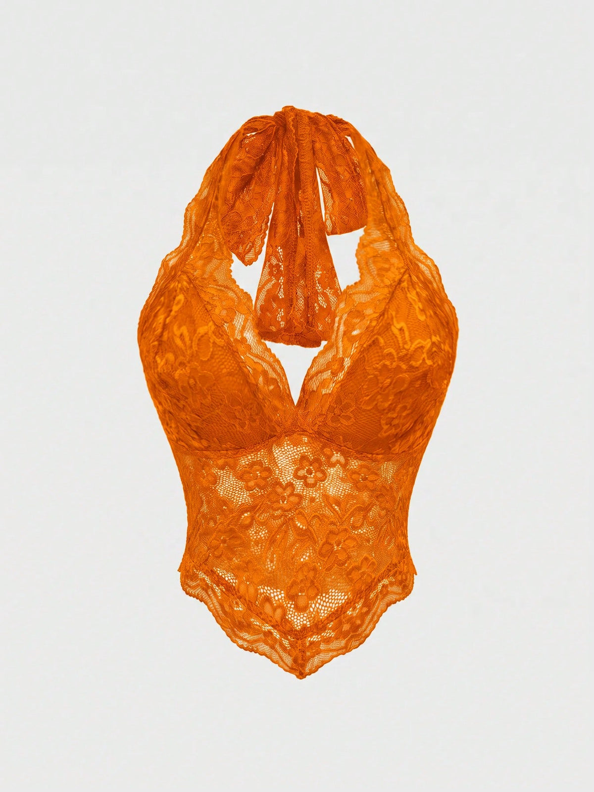 Women's lace halter neck crop top with backless tie closure, scallop trim, and asymmetrical hem.