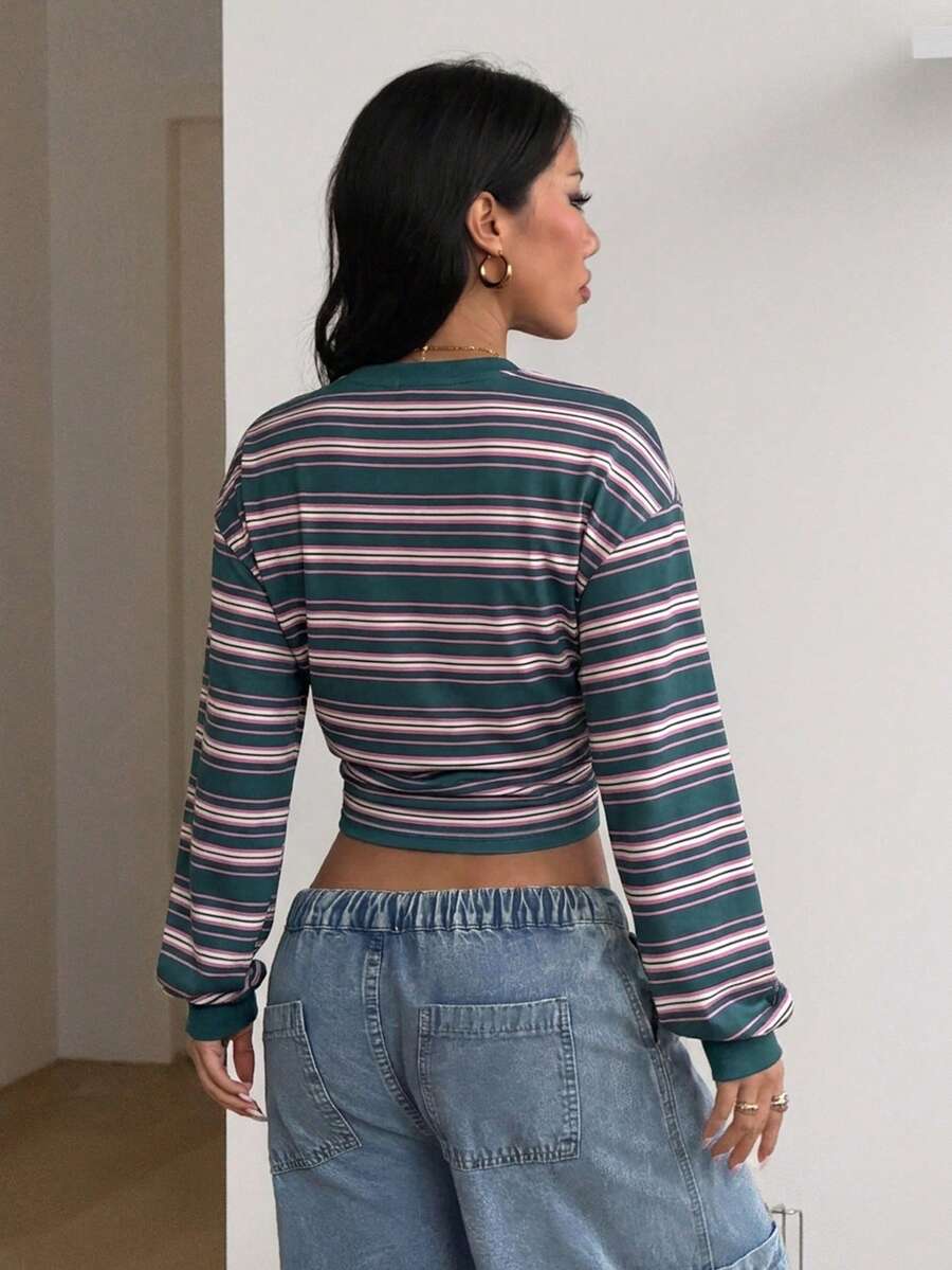 Women's brown waist-cinching sweatshirt featuring a round neck, drop shoulder long sleeves, and rib-knit cuffs.