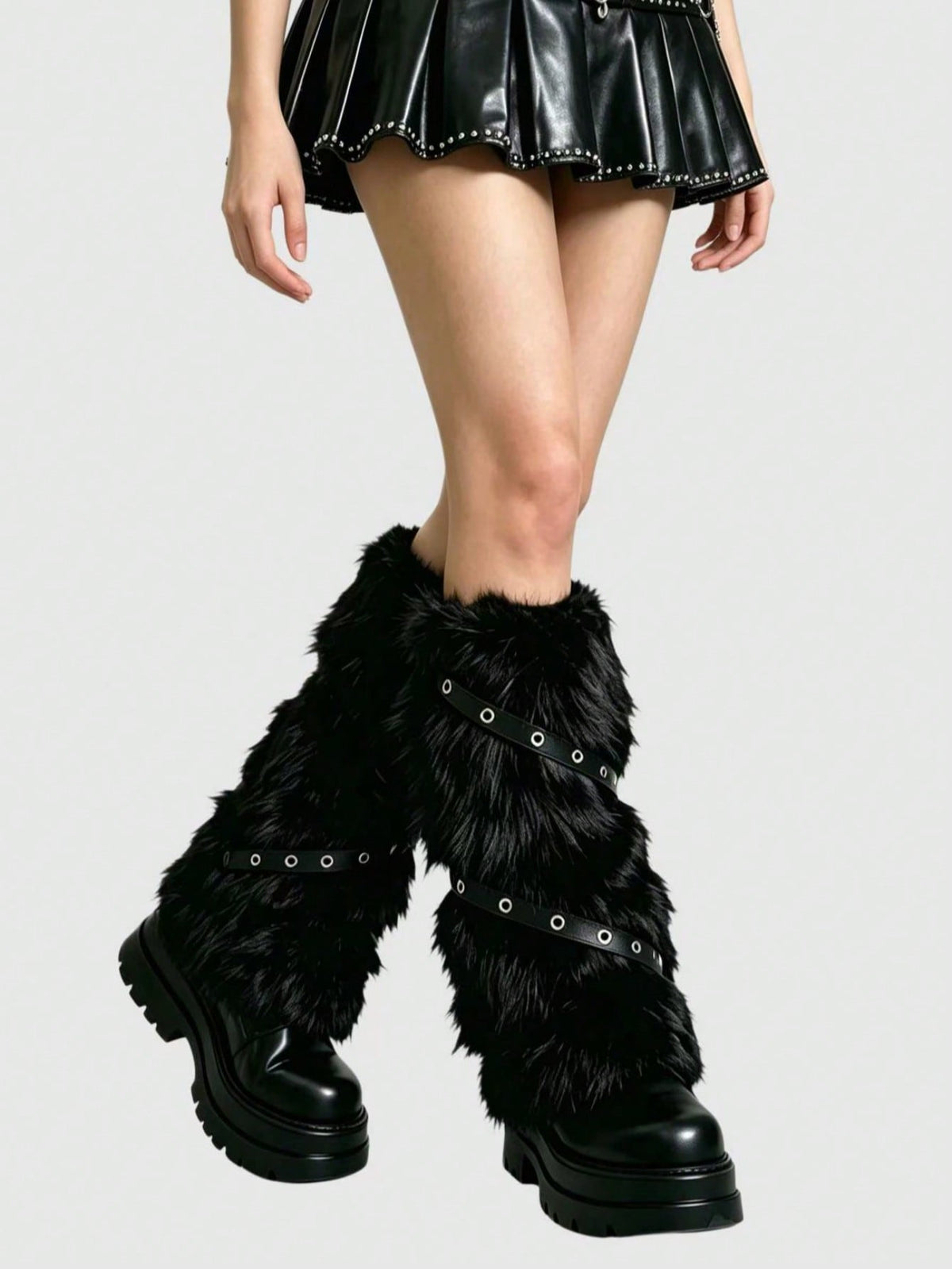Pair of fuzzy leopard print leg warmers for women in a stylish winter goth aesthetic