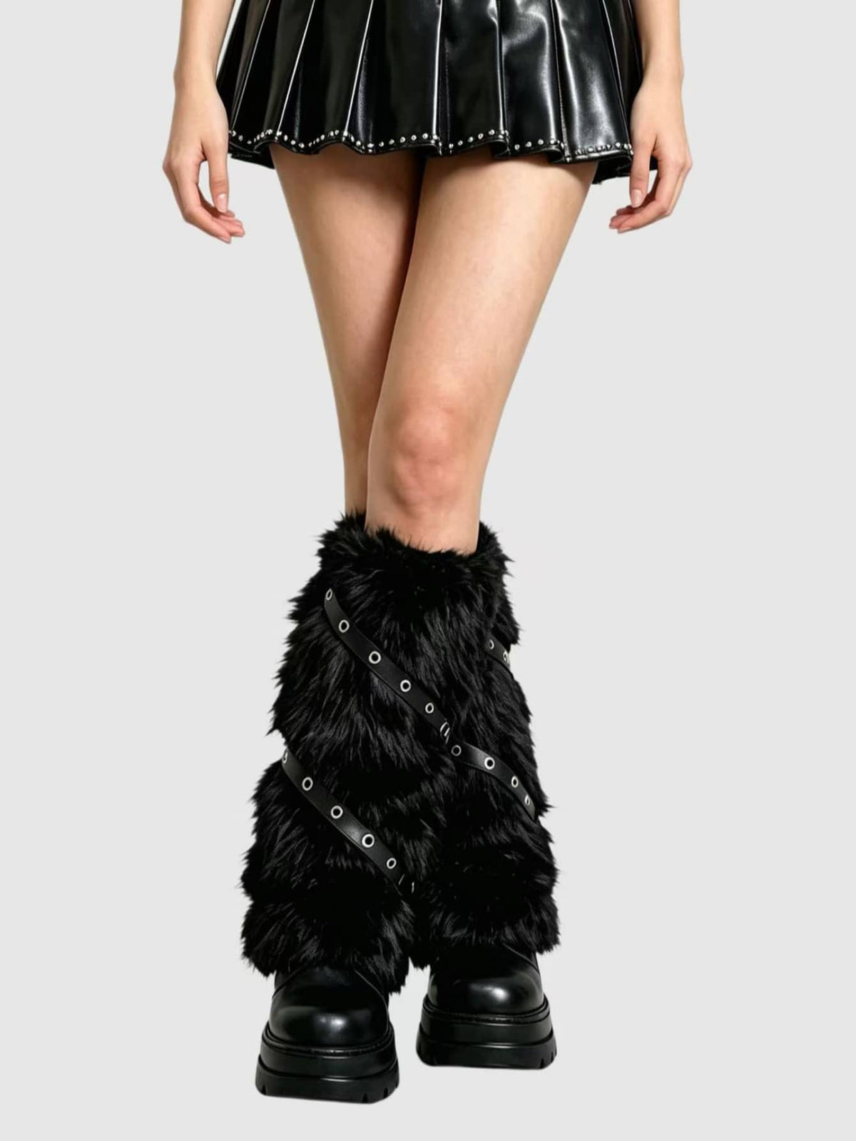 Pair of fuzzy leopard print leg warmers for women in a stylish winter goth aesthetic