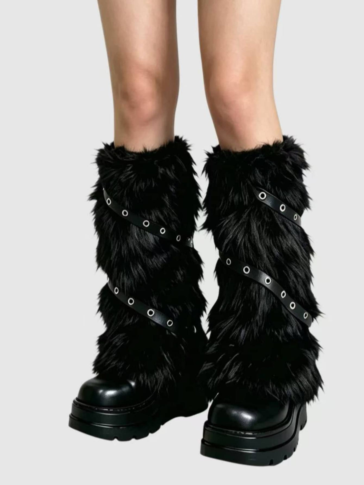 Pair of fuzzy leopard print leg warmers for women in a stylish winter goth aesthetic