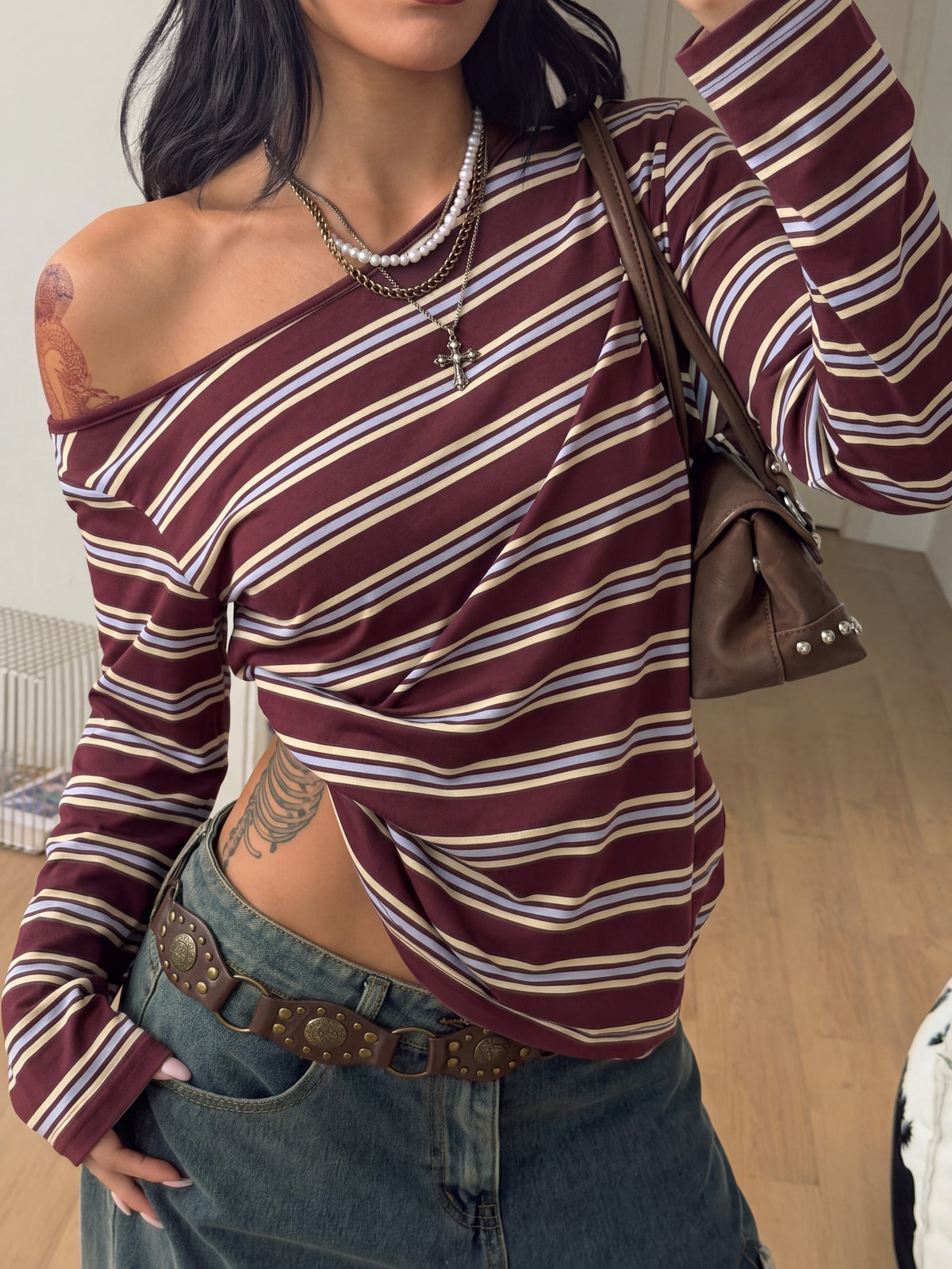 Women's brown striped boat neck long sleeve raglan T-shirt with a loose casual fit
