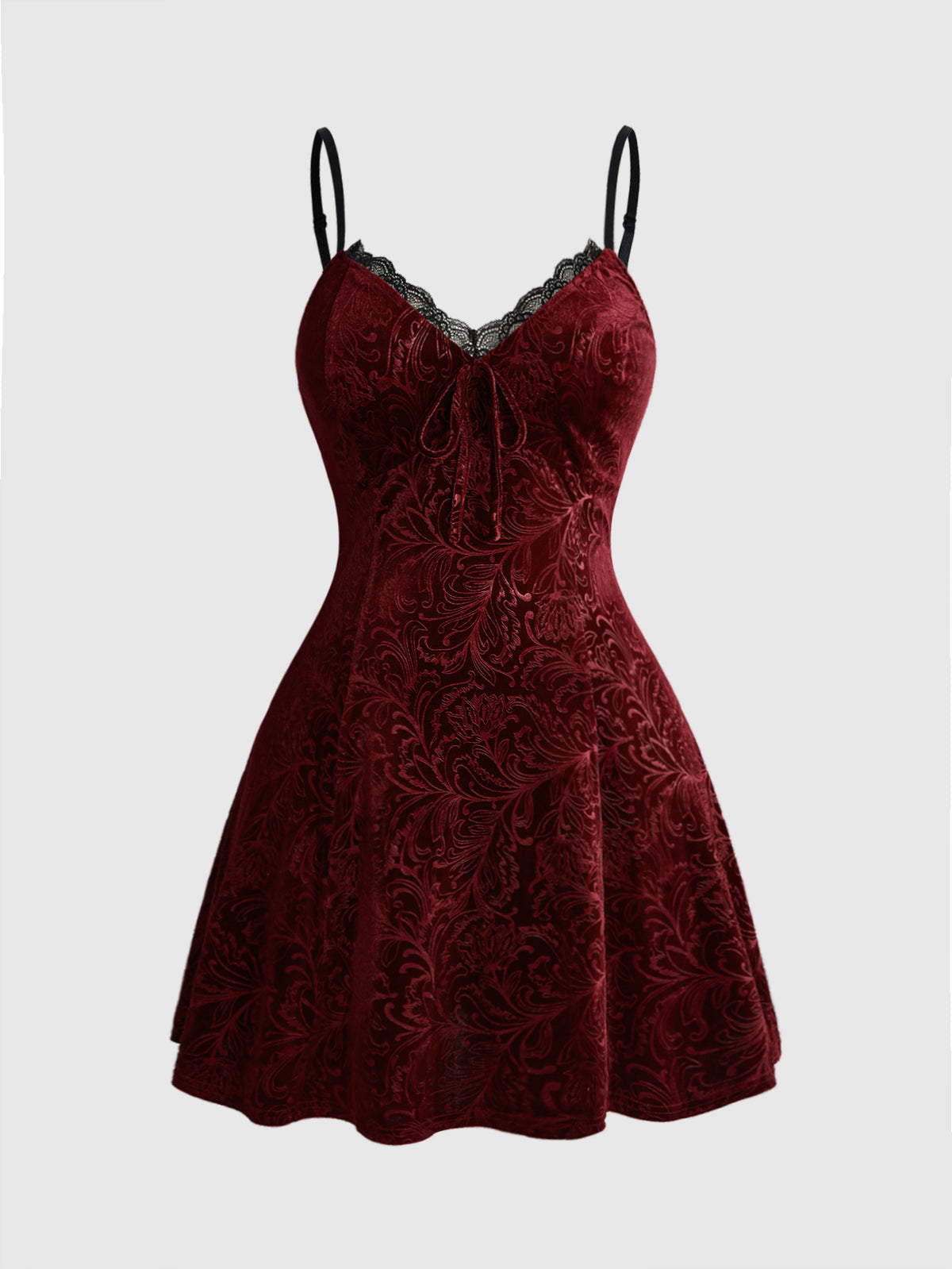 Plus size velvet slip dress featuring delicate contrast lace trim, spaghetti straps, and flared mini skirt with matching arm sleeves.