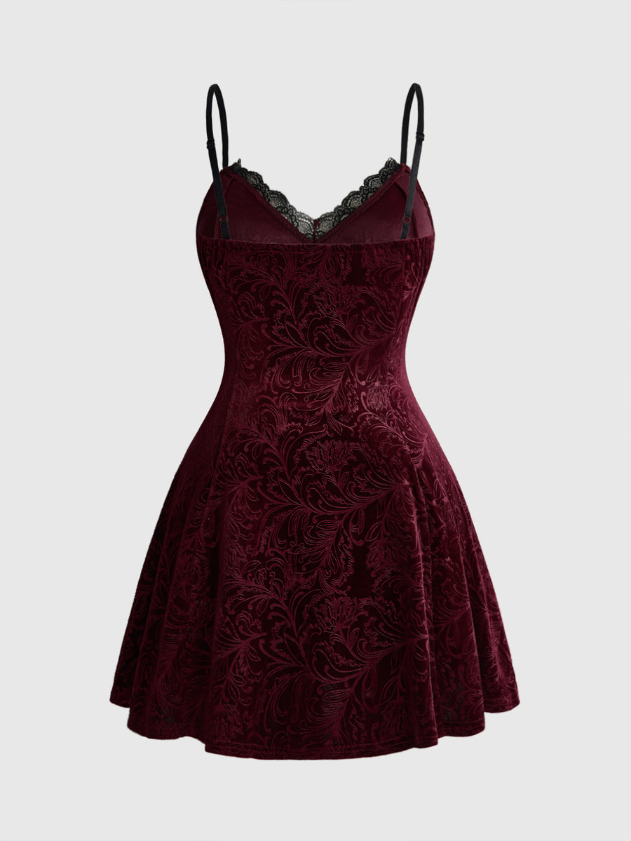 Plus size velvet slip dress featuring delicate contrast lace trim, spaghetti straps, and flared mini skirt with matching arm sleeves.