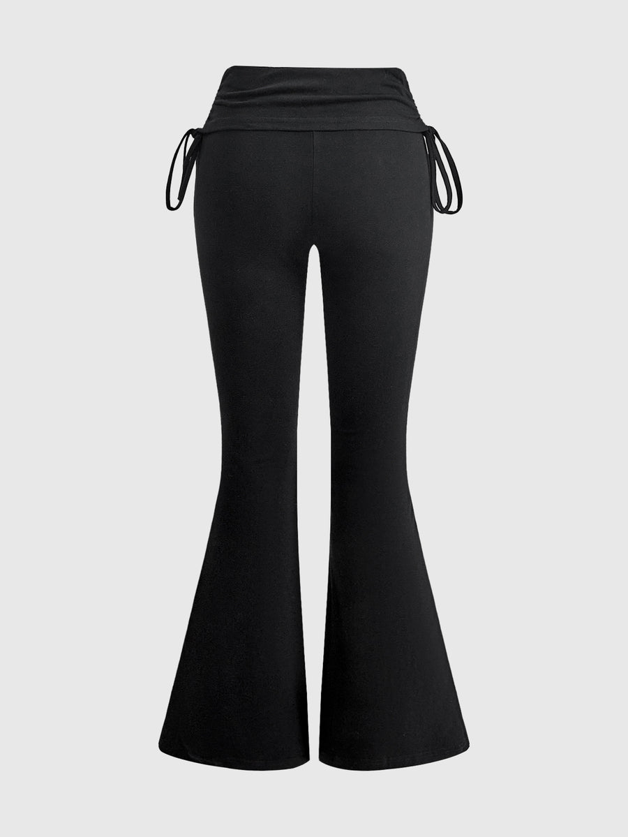Women's low waist flare leg pants featuring an elastic drawstring waistband and ruched detail in knitted fabric.