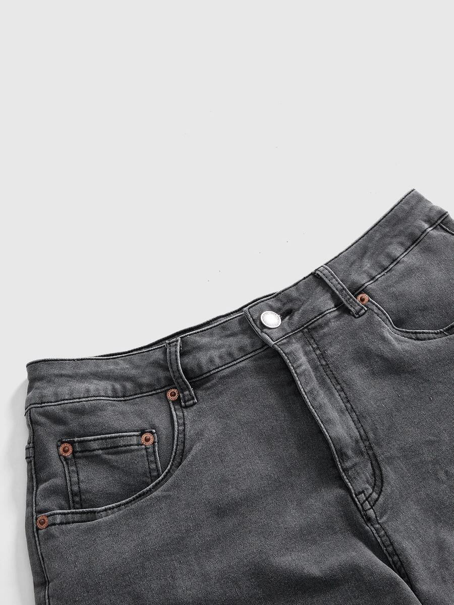 Front view of women's plus size skinny denim shorts featuring lace patchwork detailing, mid-rise waist, button zipper closure, and classic pockets.