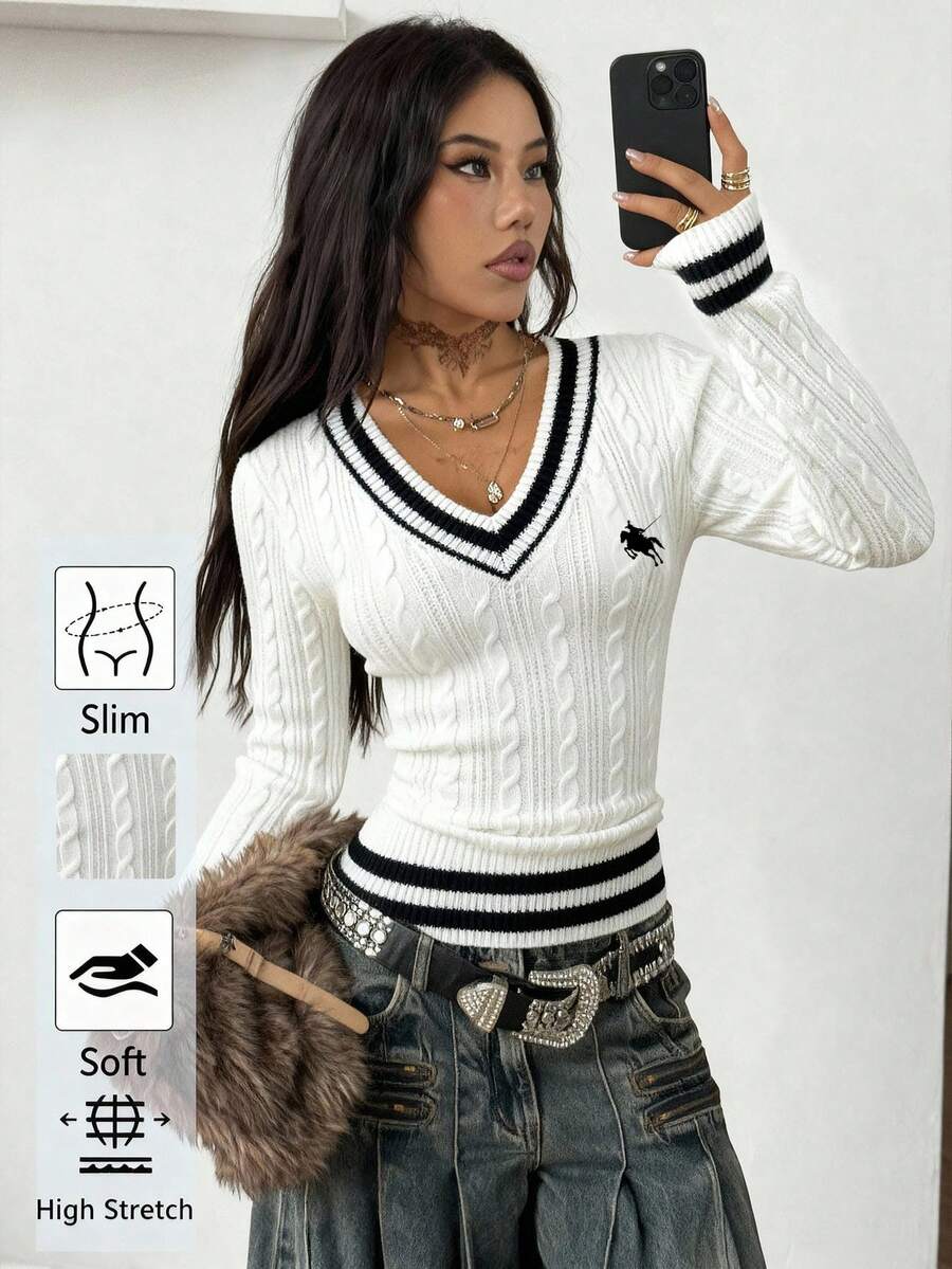 Women's slim fit cable-knit sweater with a V-neckline and long sleeves in solid green rib knit fabric.