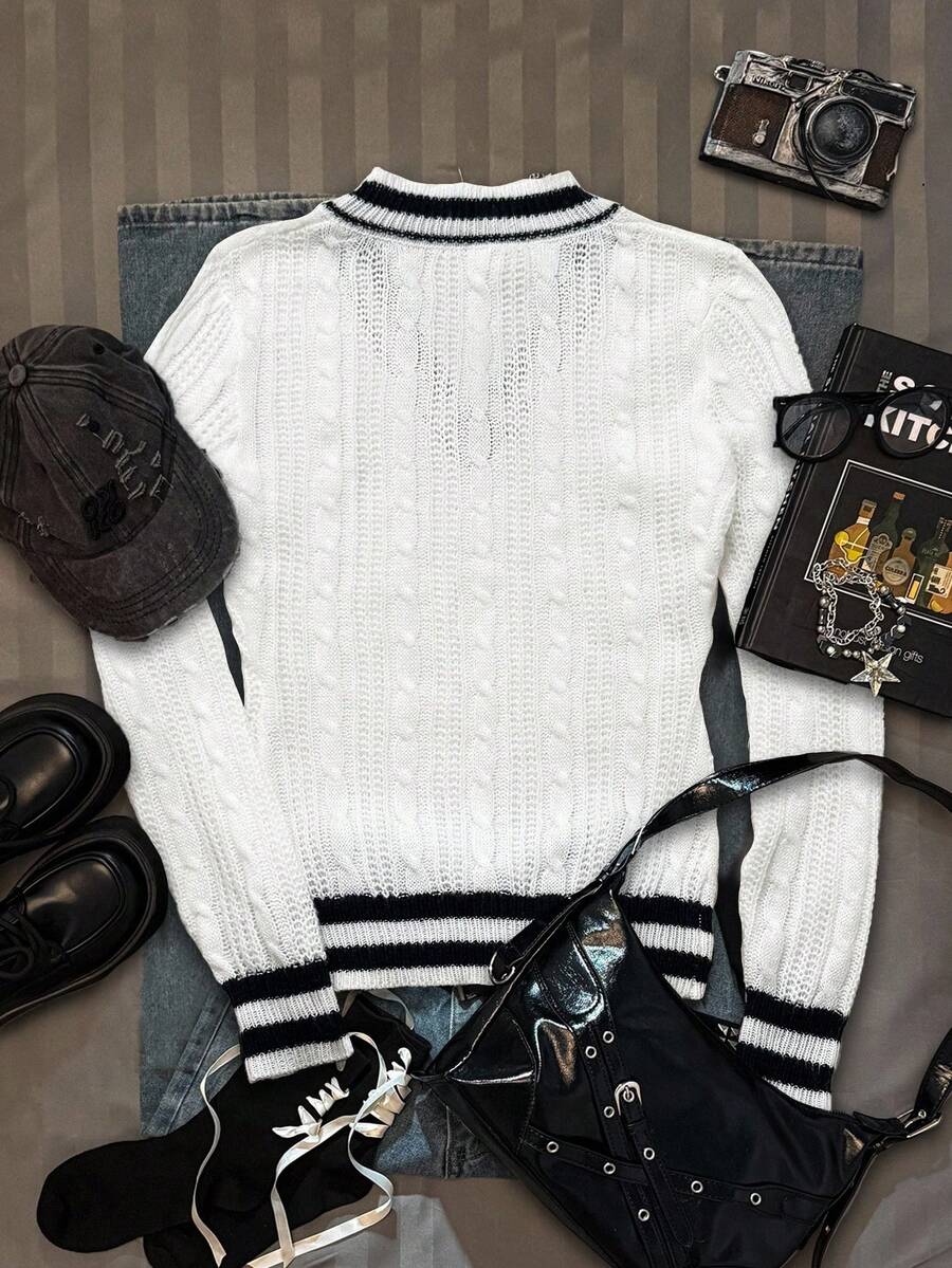 Women's slim fit cable-knit sweater with a V-neckline and long sleeves in solid green rib knit fabric.