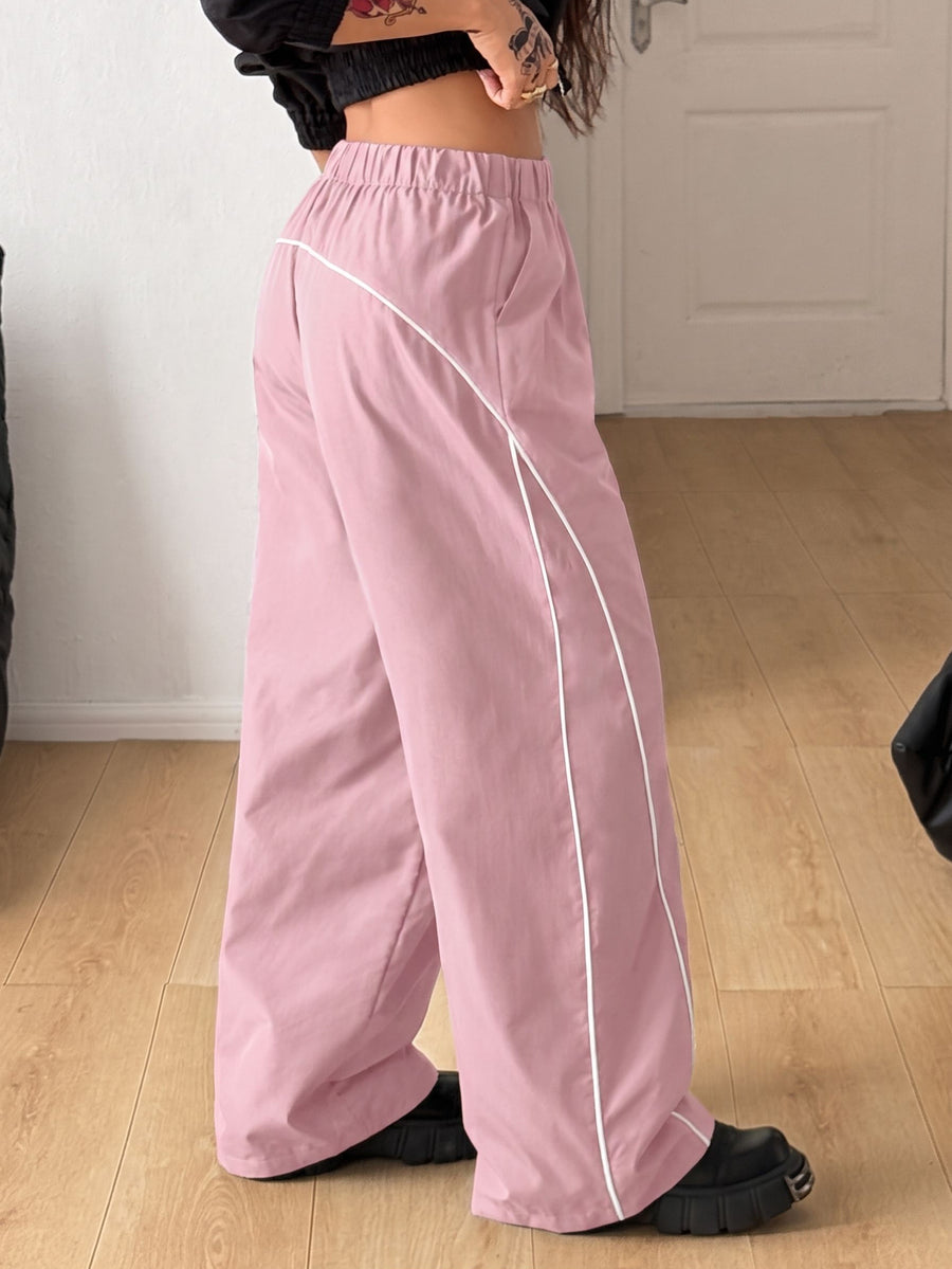Plus size loose straight leg casual pants with elastic drawstring waist, contrast binding, and side pockets.