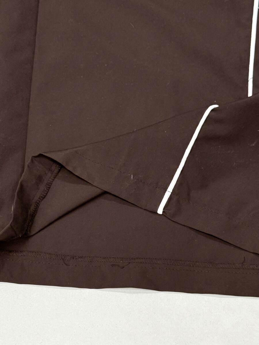 Plus size loose straight leg casual pants with elastic drawstring waist, contrast binding, and side pockets.