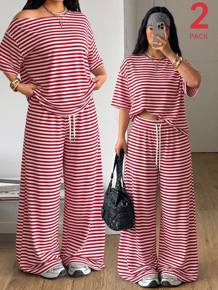 Women's casual two-piece outfit featuring a loose short-sleeve asymmetrical neck t-shirt and matching long wide leg pants with pockets.