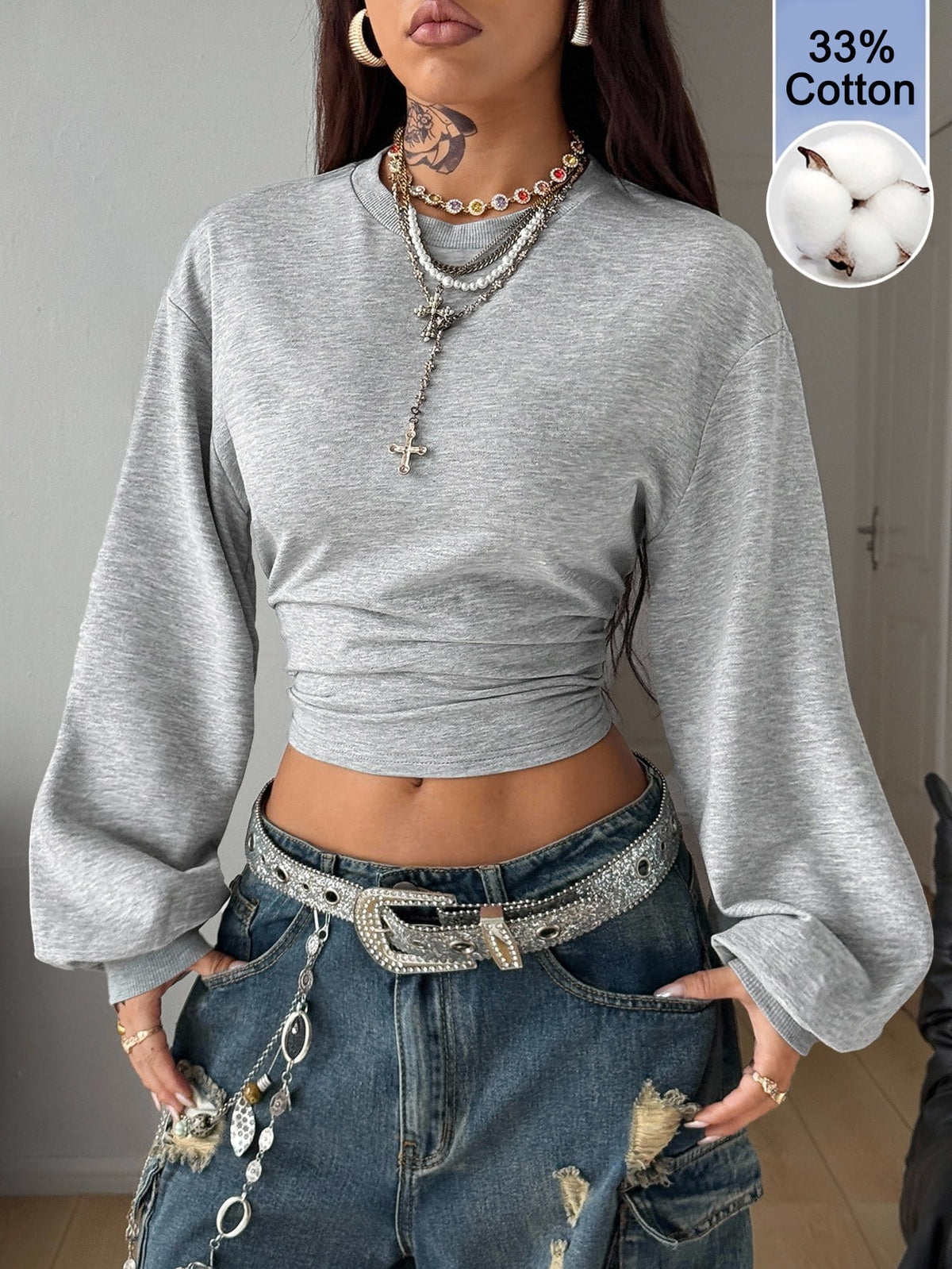 Women's brown waist-cinching sweatshirt featuring a round neck, drop shoulder long sleeves, and rib-knit cuffs.