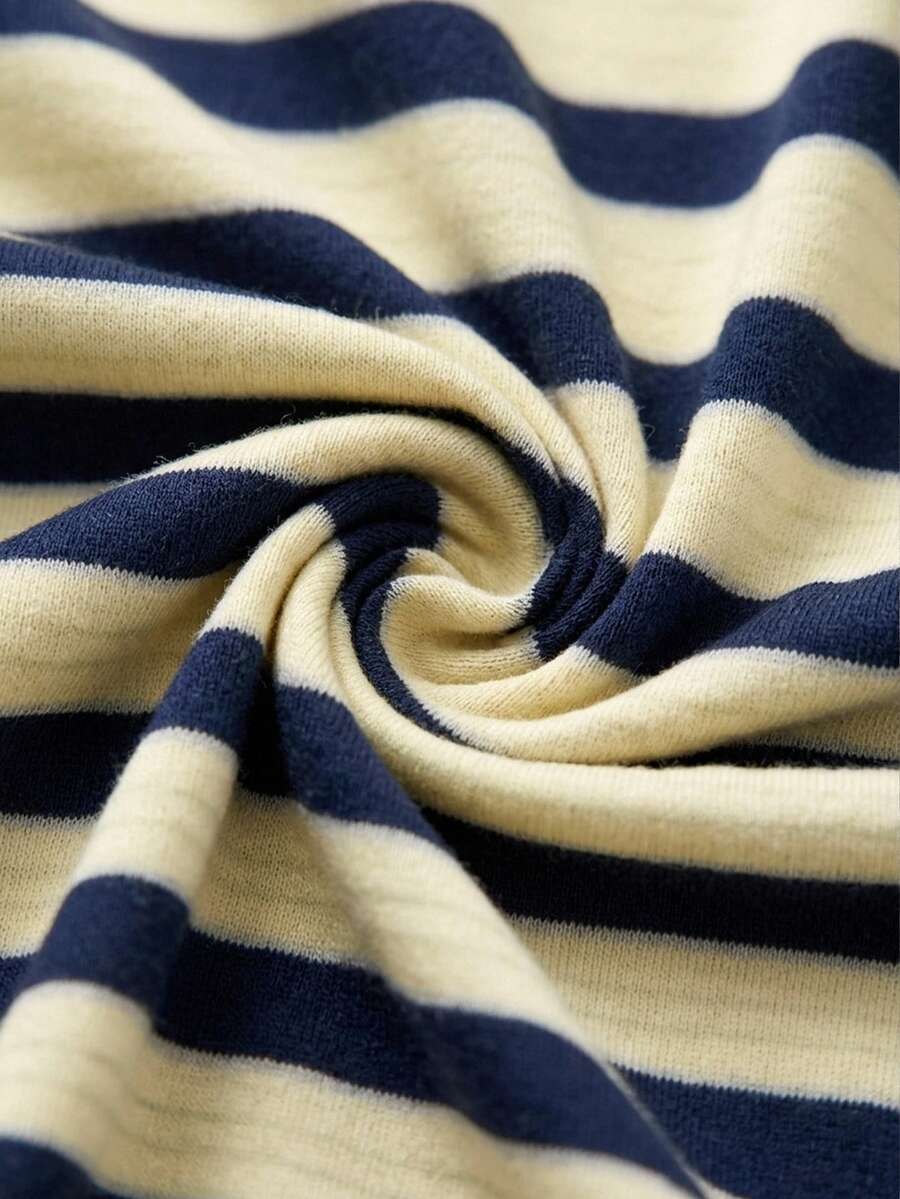 Women's striped pullover sweatshirt featuring drop shoulder long sleeves and a classic round neckline.