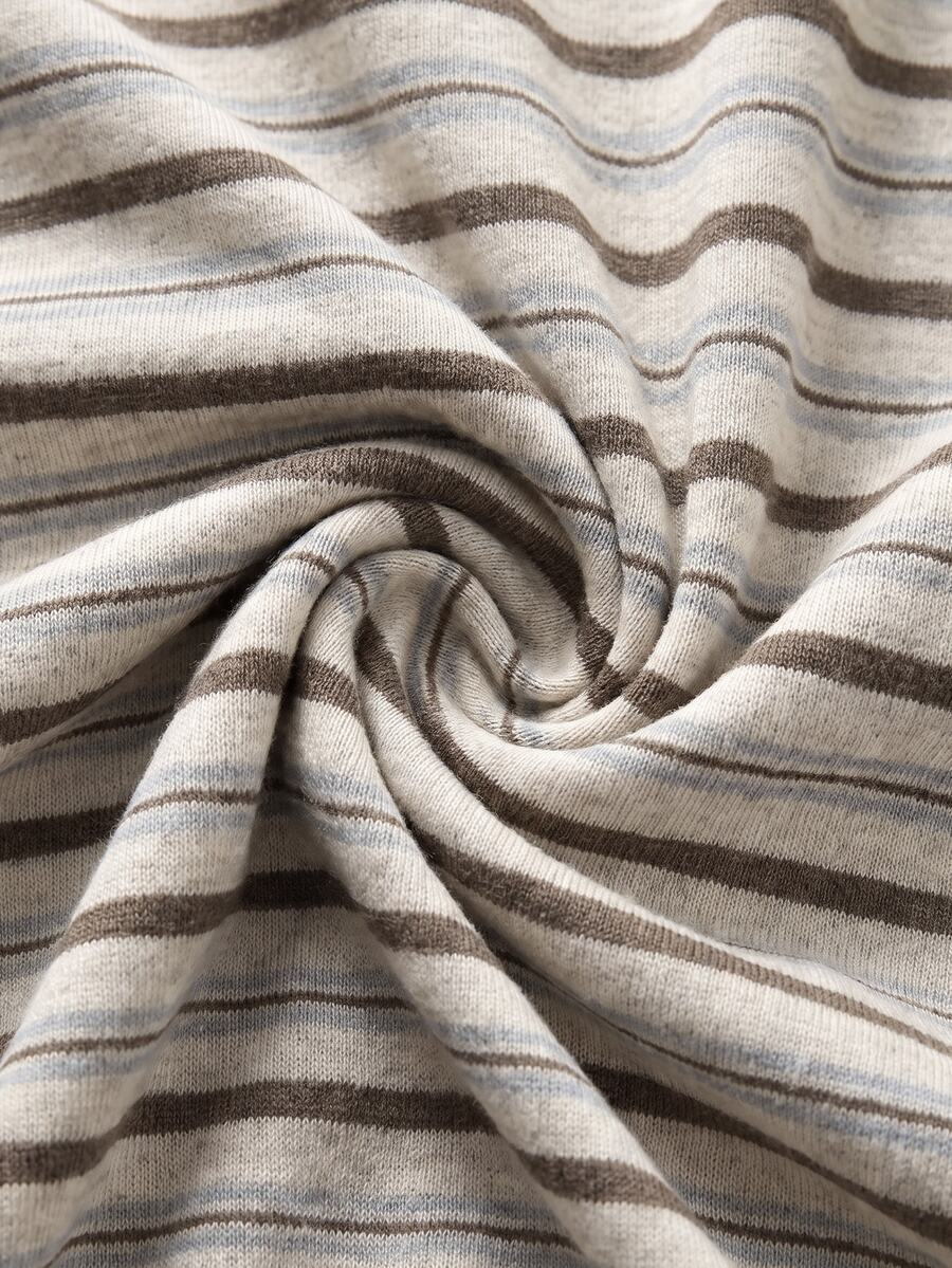 Women's striped pullover sweatshirt featuring drop shoulder long sleeves and a classic round neckline.