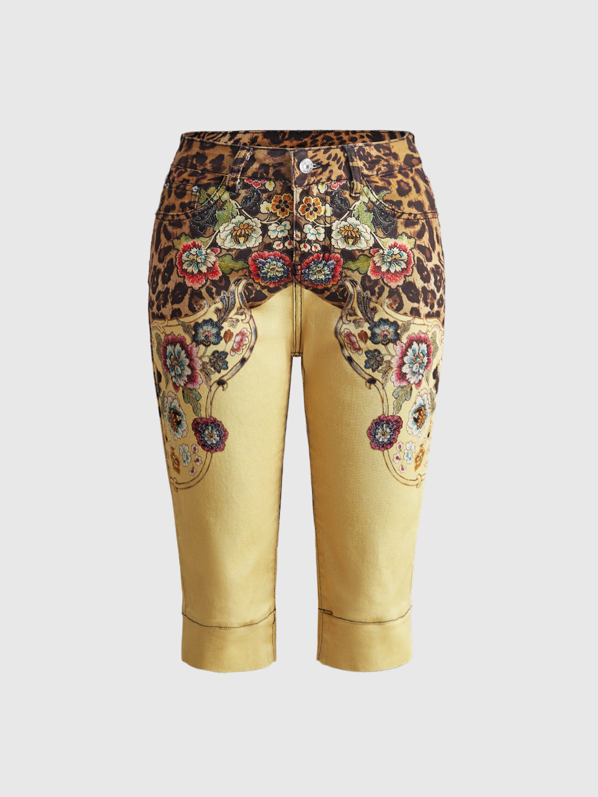 Women's leopard and floral print denim capri jeans featuring an ultra low waist and zipper fly closure.
