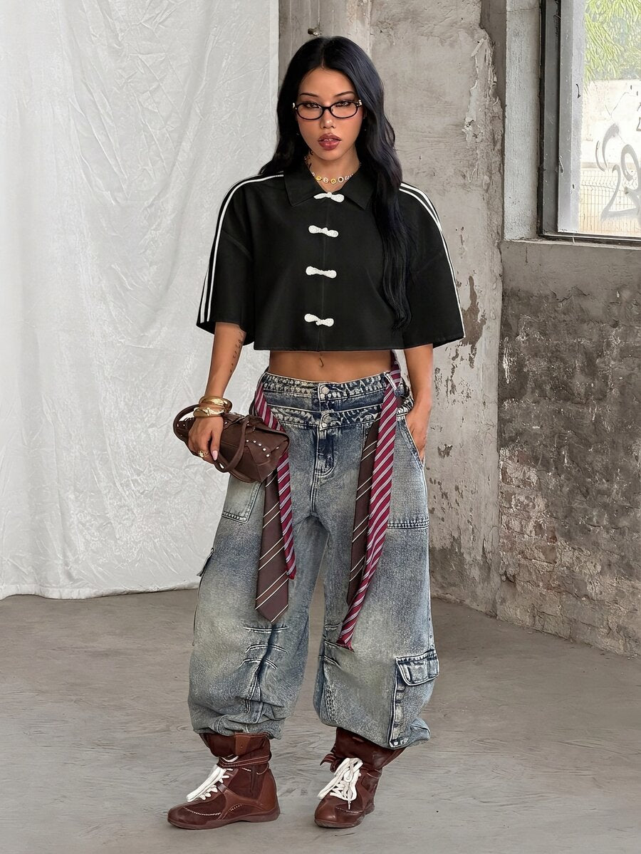 Women's plaid crop shirt with button front, chest pocket, short sleeves, and loose casual fit.