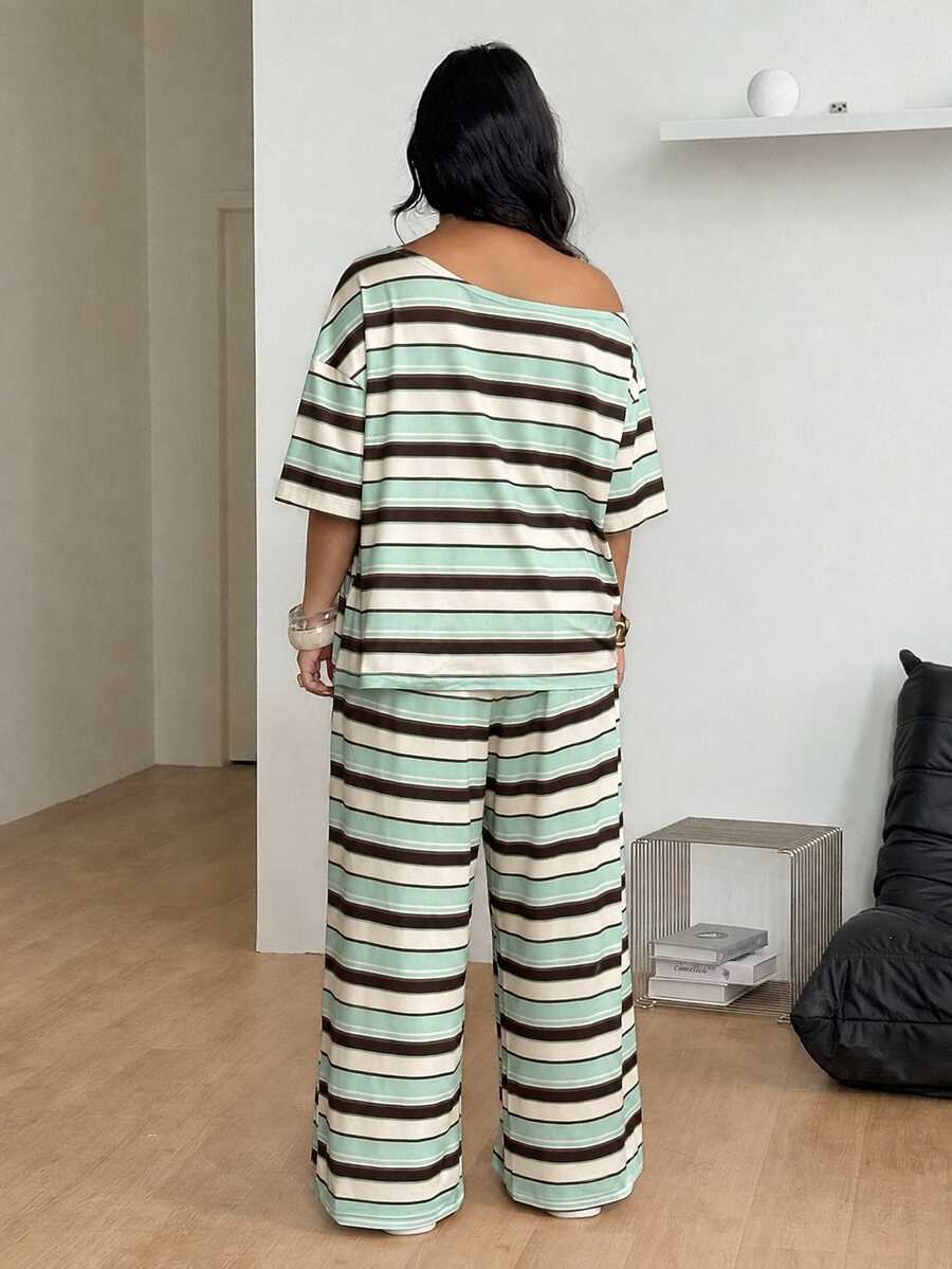 Striped two-piece casual outfit featuring an asymmetrical off-shoulder short-sleeve top and matching loose wide-leg pants with side pockets.