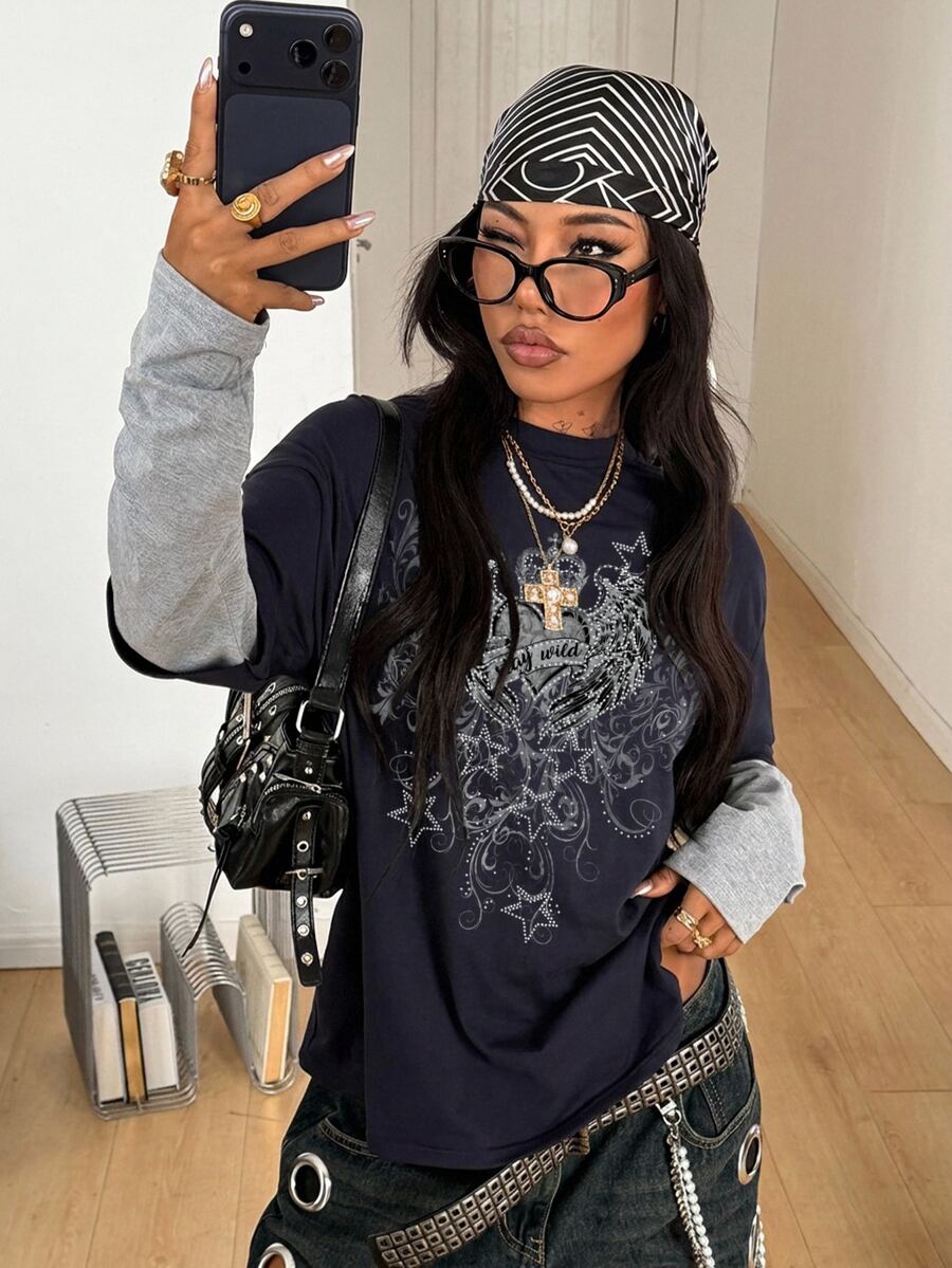 Women's casual 2-in-1 striped long sleeve graphic t-shirt featuring a round neckline, drop shoulders, rib-knit accents, and a loose fit.