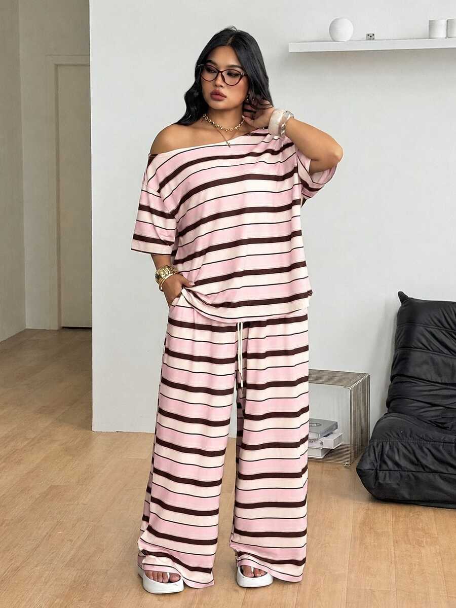 Striped two-piece casual outfit featuring an asymmetrical off-shoulder short-sleeve top and matching loose wide-leg pants with side pockets.