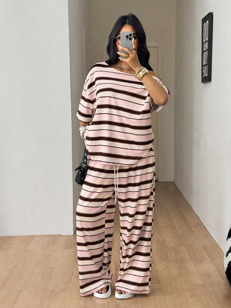 Striped two-piece casual outfit featuring an asymmetrical off-shoulder short-sleeve top and matching loose wide-leg pants with side pockets.