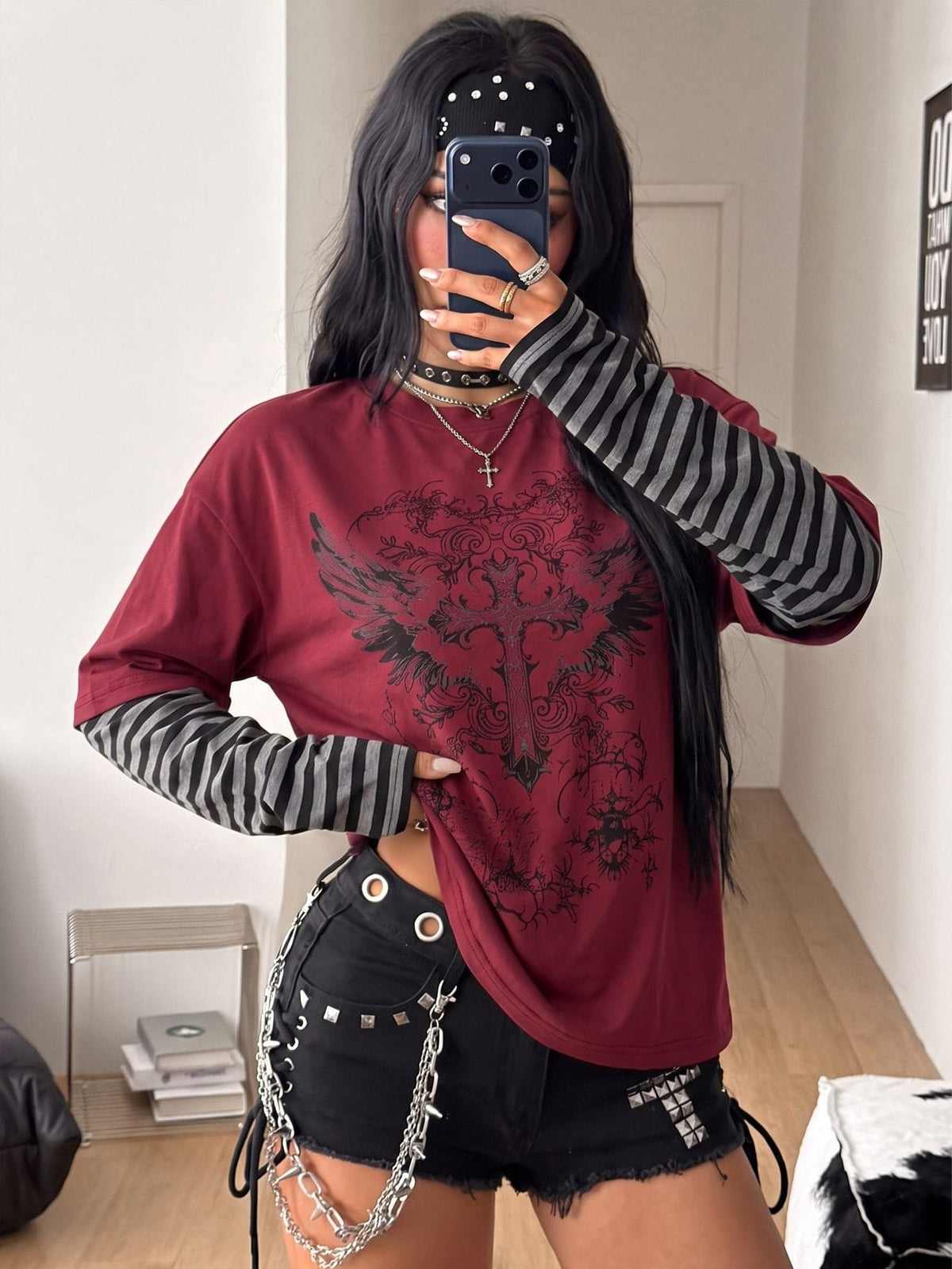 Women's casual graphic long sleeve t-shirt with a round neck, drop shoulder sleeves, and loose relaxed fit.