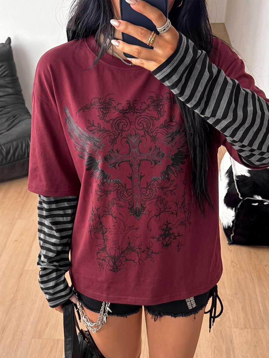 Women's casual graphic long sleeve t-shirt with a round neck, drop shoulder sleeves, and loose relaxed fit.