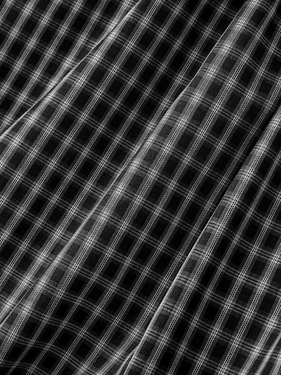 Women's plaid mini dress featuring a contrast lace Peter Pan collar, front bow accent, and short puff sleeves in a loose fit.