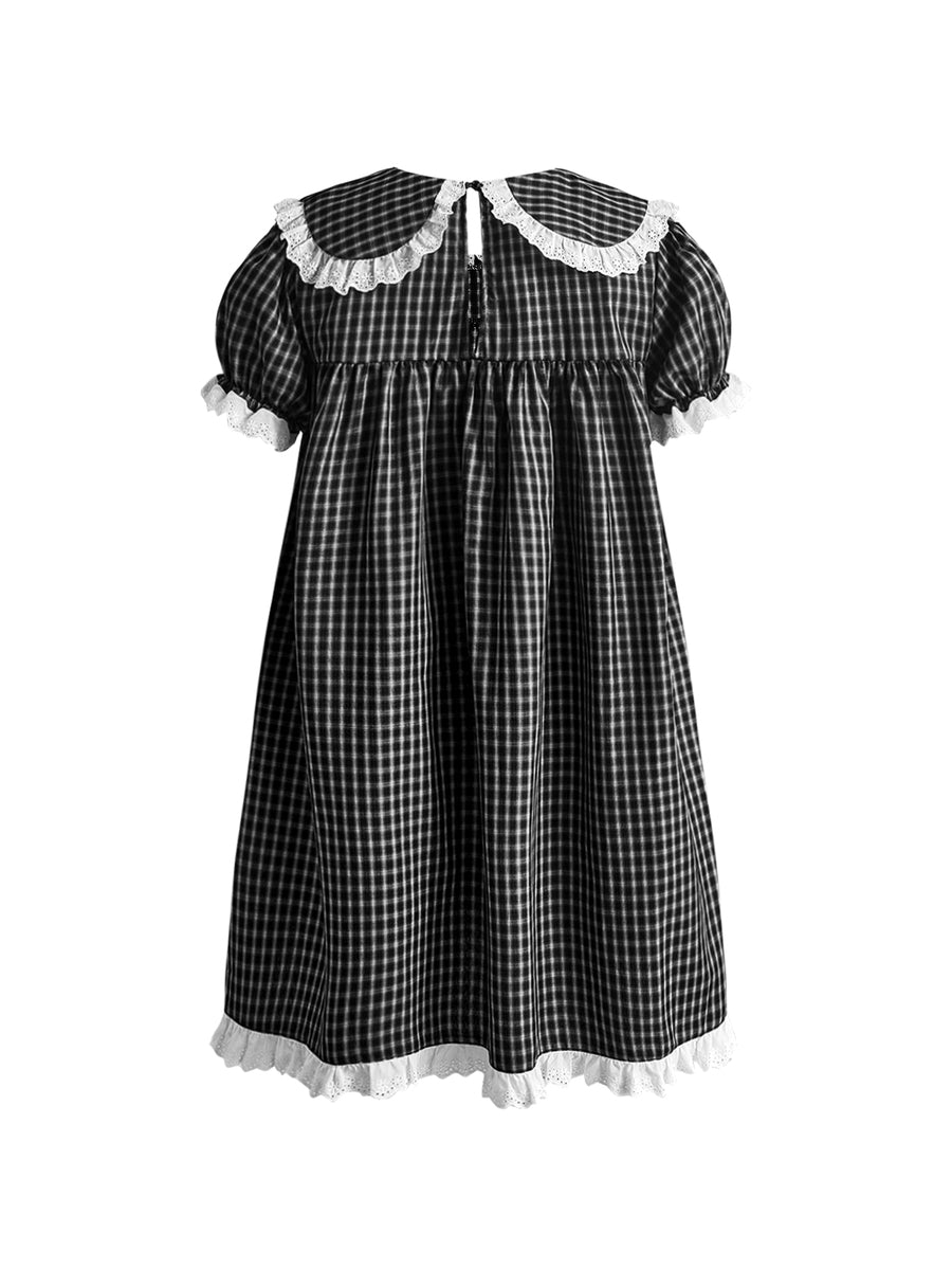 Women's plaid mini dress featuring a contrast lace Peter Pan collar, front bow accent, and short puff sleeves in a loose fit.