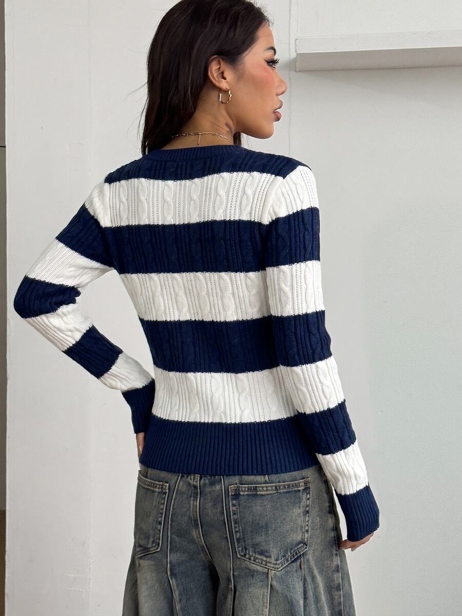Women's slim fit cable-knit sweater with a V-neckline and long sleeves in solid green rib knit fabric.