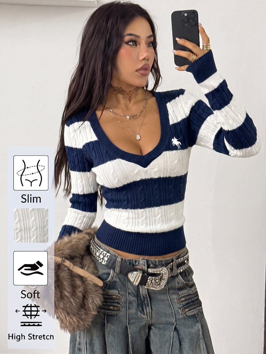 Women's slim fit cable-knit sweater with a V-neckline and long sleeves in solid green rib knit fabric.
