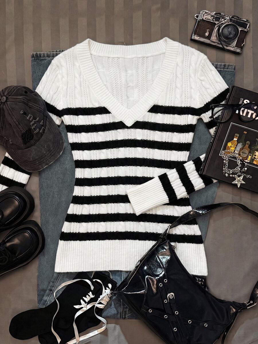 Women's slim fit cable-knit sweater with a V-neckline and long sleeves in solid green rib knit fabric.
