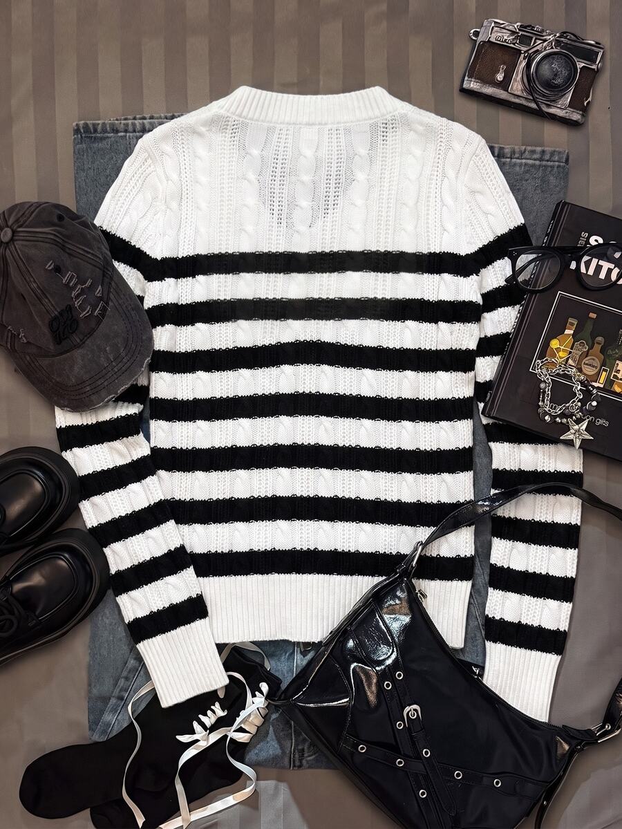 Women's slim fit cable-knit sweater with a V-neckline and long sleeves in solid green rib knit fabric.