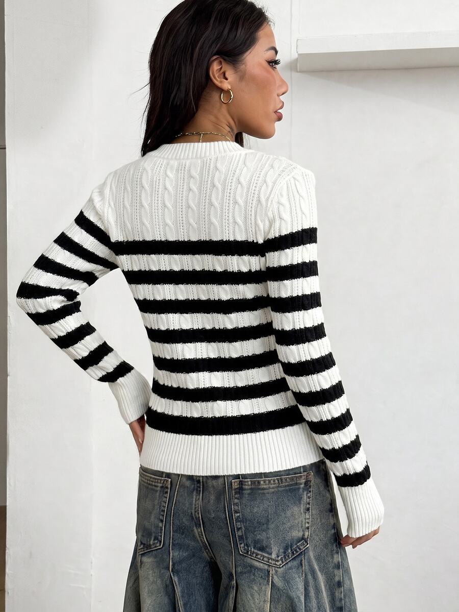 Women's slim fit cable-knit sweater with a V-neckline and long sleeves in solid green rib knit fabric.