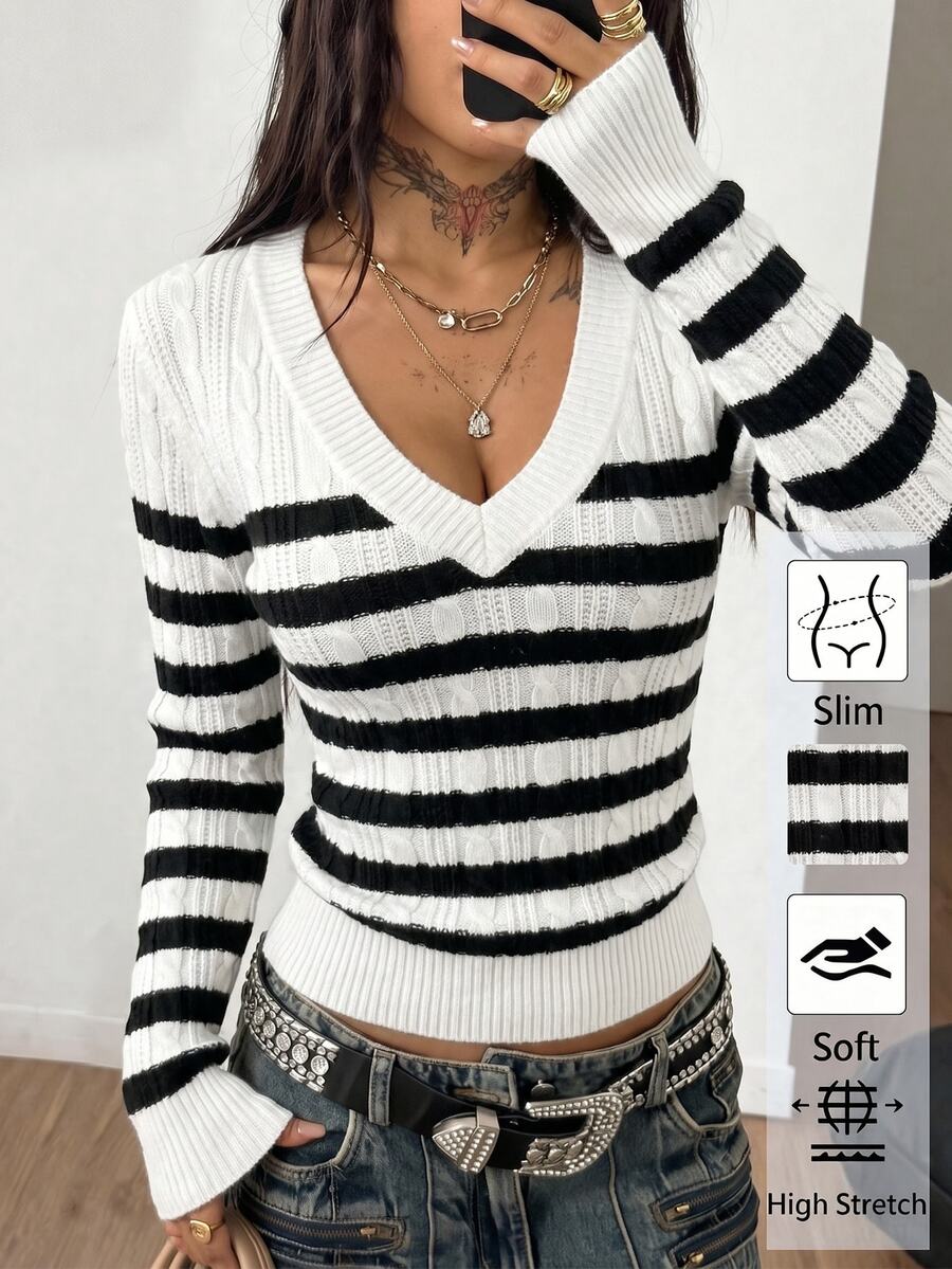 Women's slim fit cable-knit sweater with a V-neckline and long sleeves in solid green rib knit fabric.
