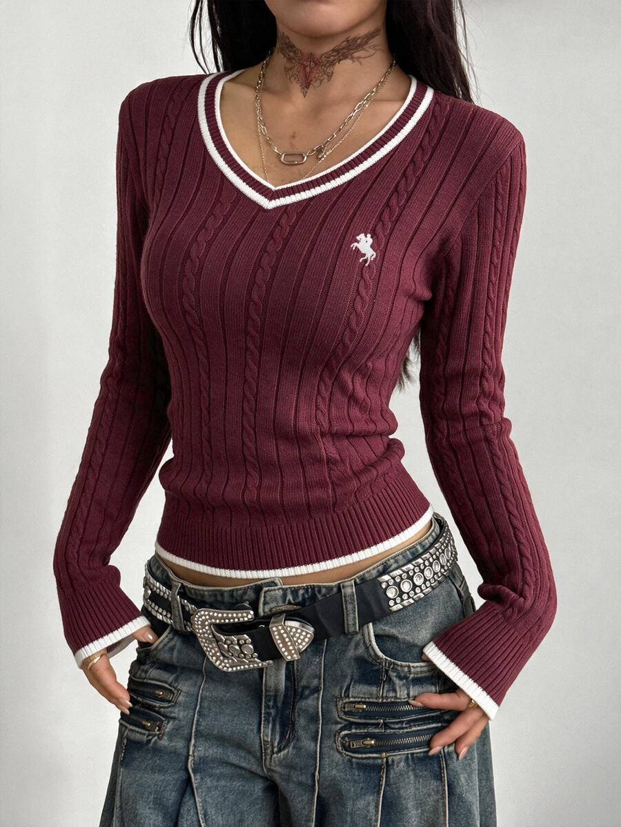 Women's slim fit cable-knit sweater with a V-neckline and long sleeves in solid green rib knit fabric.