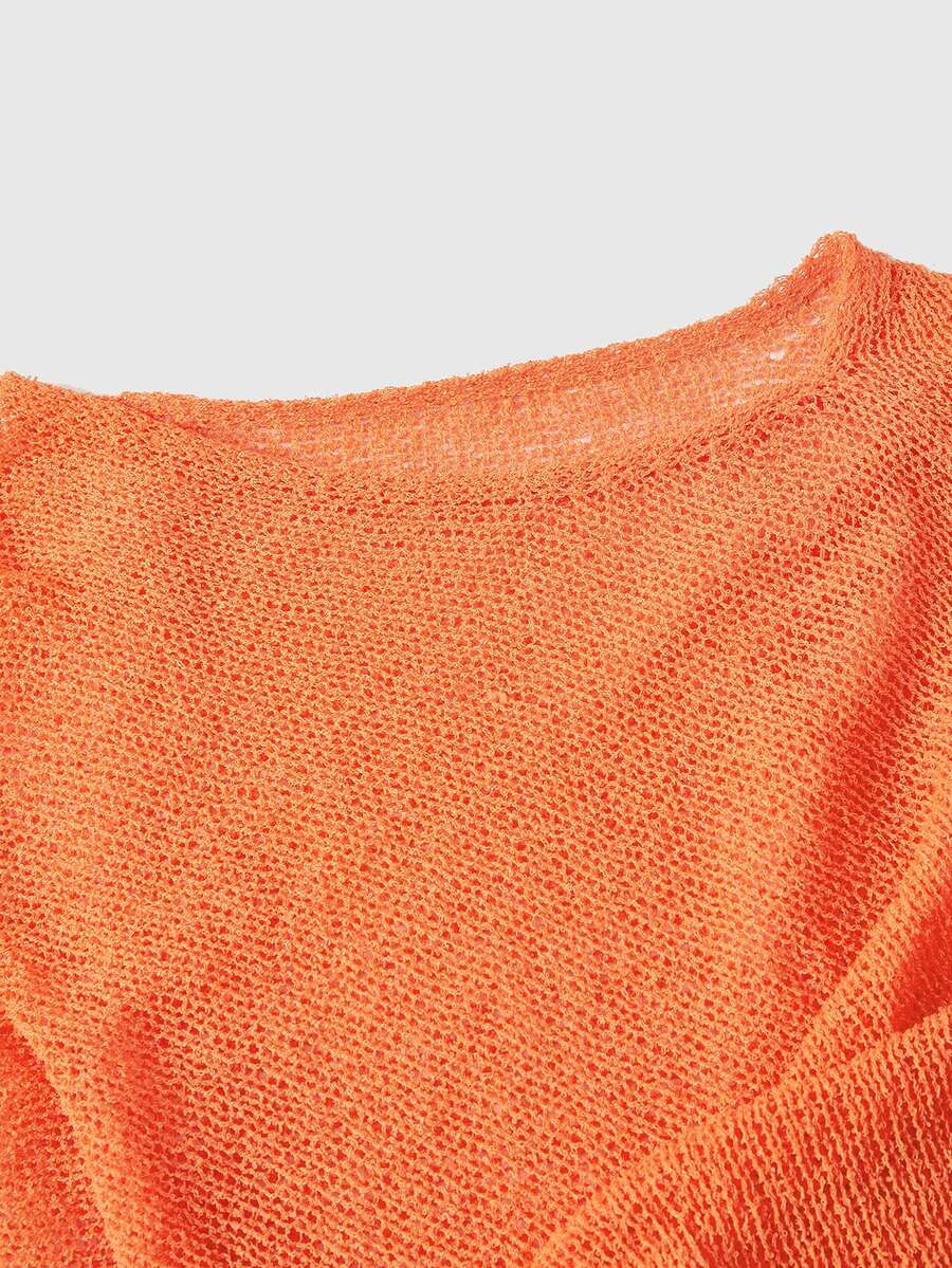 Women's casual hollow knit poncho top with boat neck, cloak sleeves, and asymmetrical hem