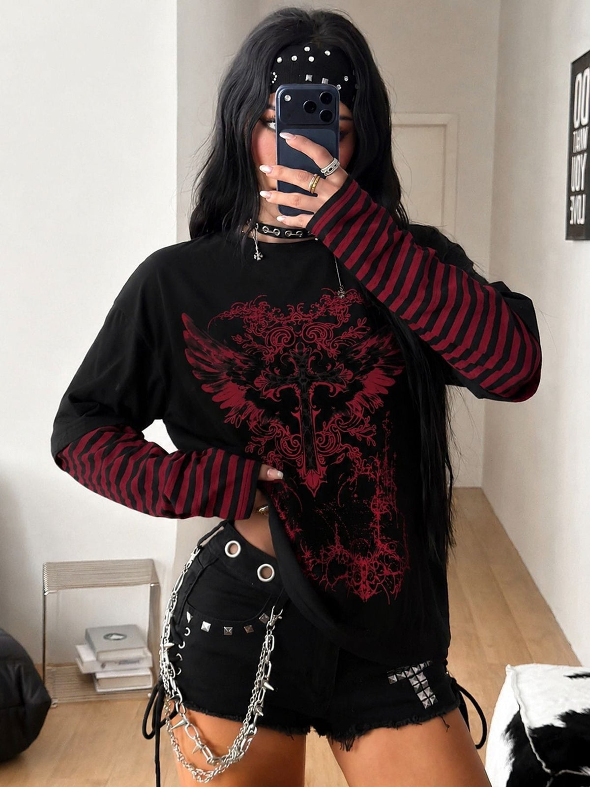 Women's casual graphic long sleeve t-shirt with a round neck, drop shoulder sleeves, and loose relaxed fit.