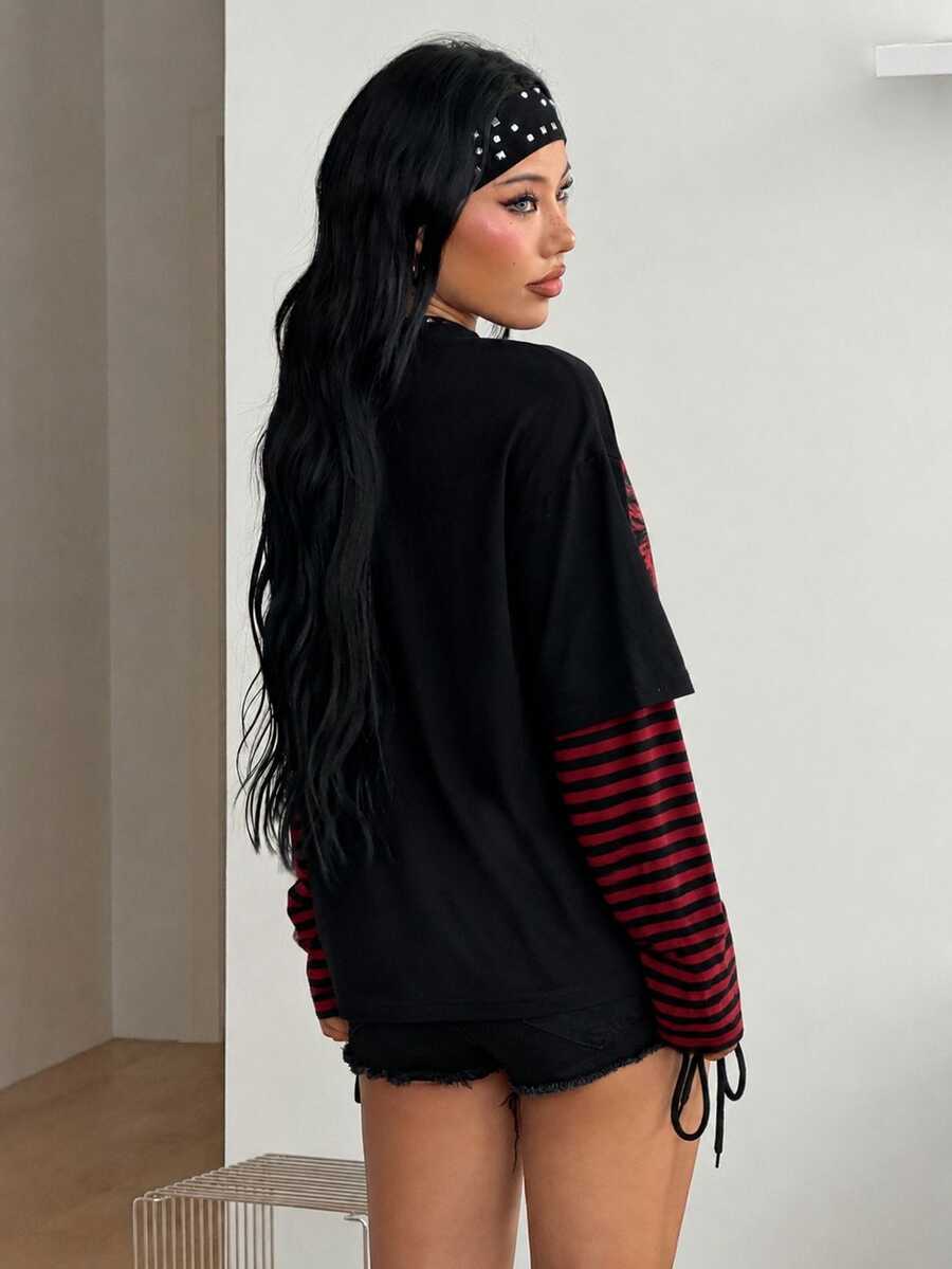 Women's casual graphic long sleeve t-shirt with a round neck, drop shoulder sleeves, and loose relaxed fit.