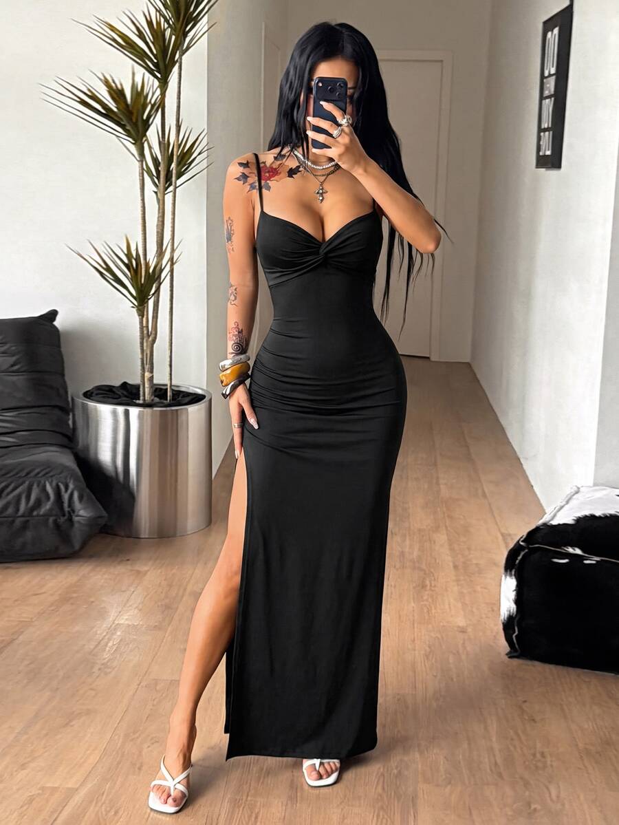 Women's backless cami midi dress in dark grey knit fabric featuring spaghetti straps, lace-up back design, and a split thigh slit.