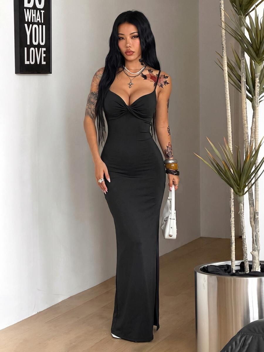 Women's backless cami midi dress in dark grey knit fabric featuring spaghetti straps, lace-up back design, and a split thigh slit.