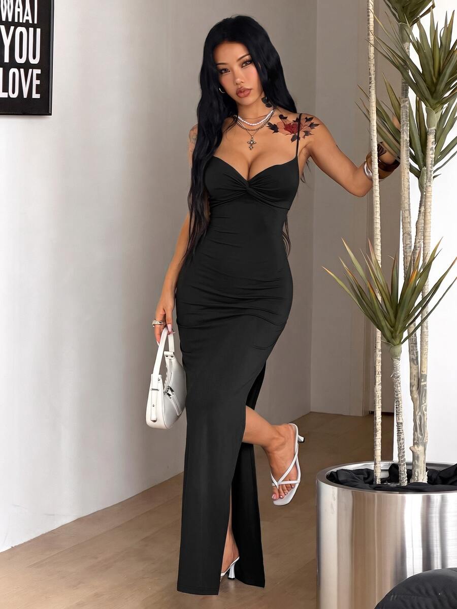 Women's backless cami midi dress in dark grey knit fabric featuring spaghetti straps, lace-up back design, and a split thigh slit.
