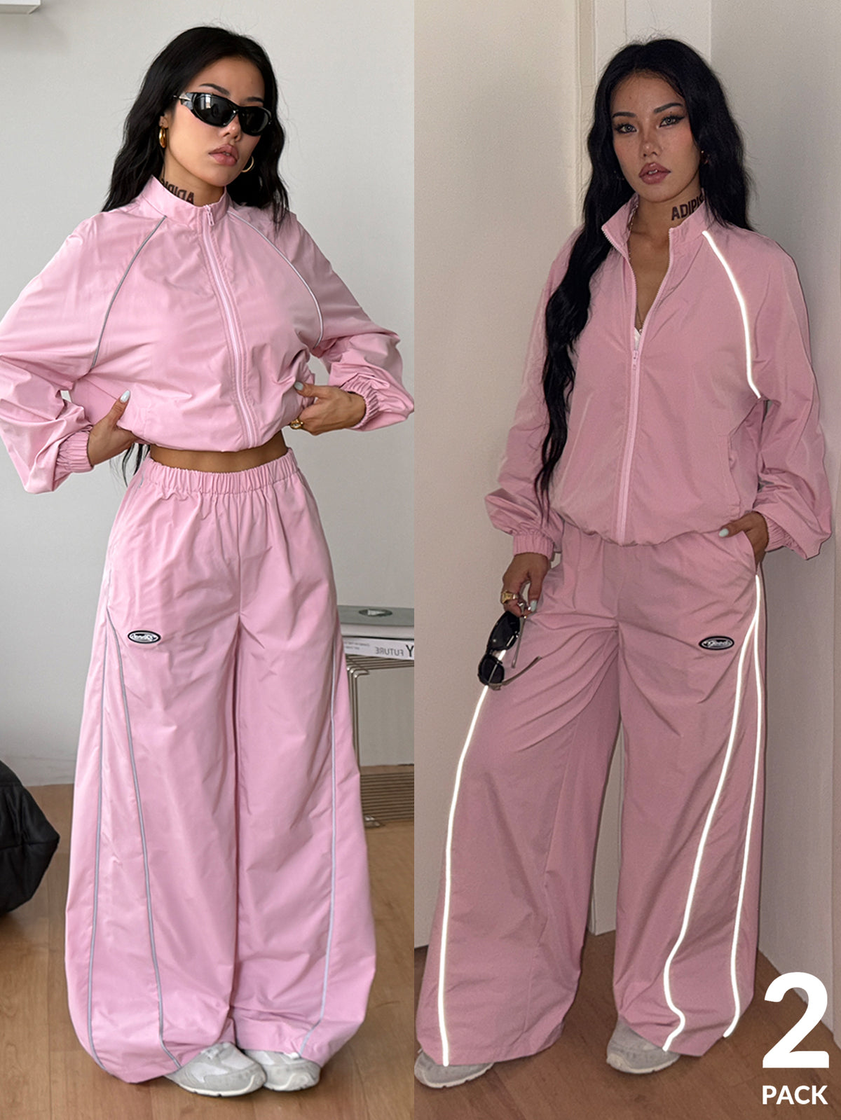 Women's two-piece sporty casual tracksuit set featuring a stand collar zip-up jacket with contrast binding and matching loose parachute pants.