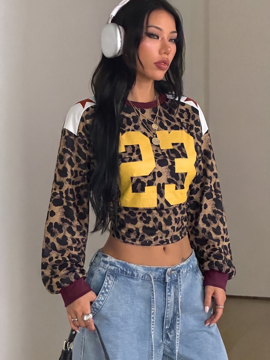 Women's brown waist-cinching sweatshirt featuring a round neck, drop shoulder long sleeves, and rib-knit cuffs.