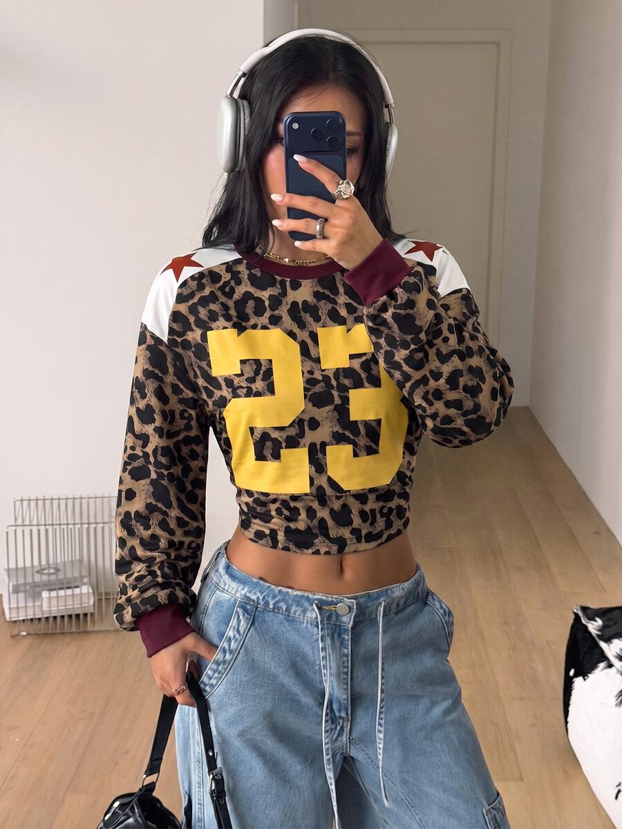 Women's brown waist-cinching sweatshirt featuring a round neck, drop shoulder long sleeves, and rib-knit cuffs.