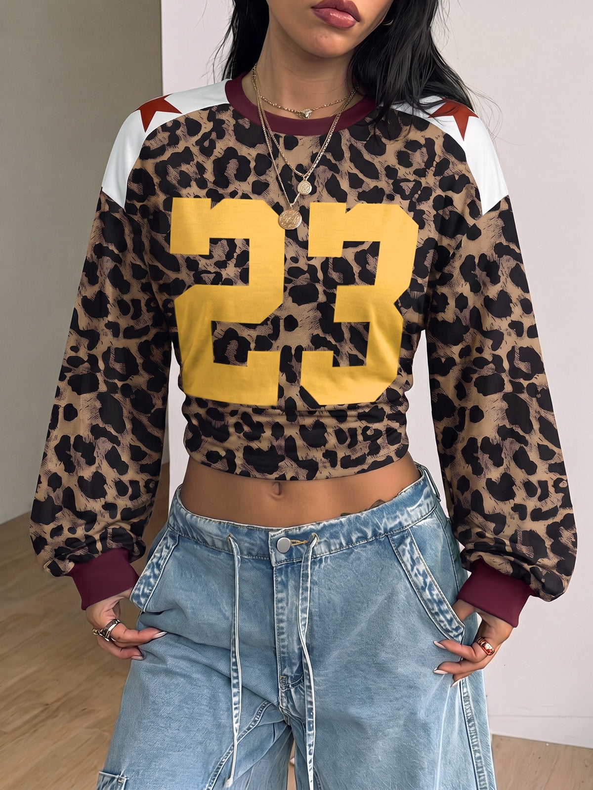 Women's brown waist-cinching sweatshirt featuring a round neck, drop shoulder long sleeves, and rib-knit cuffs.