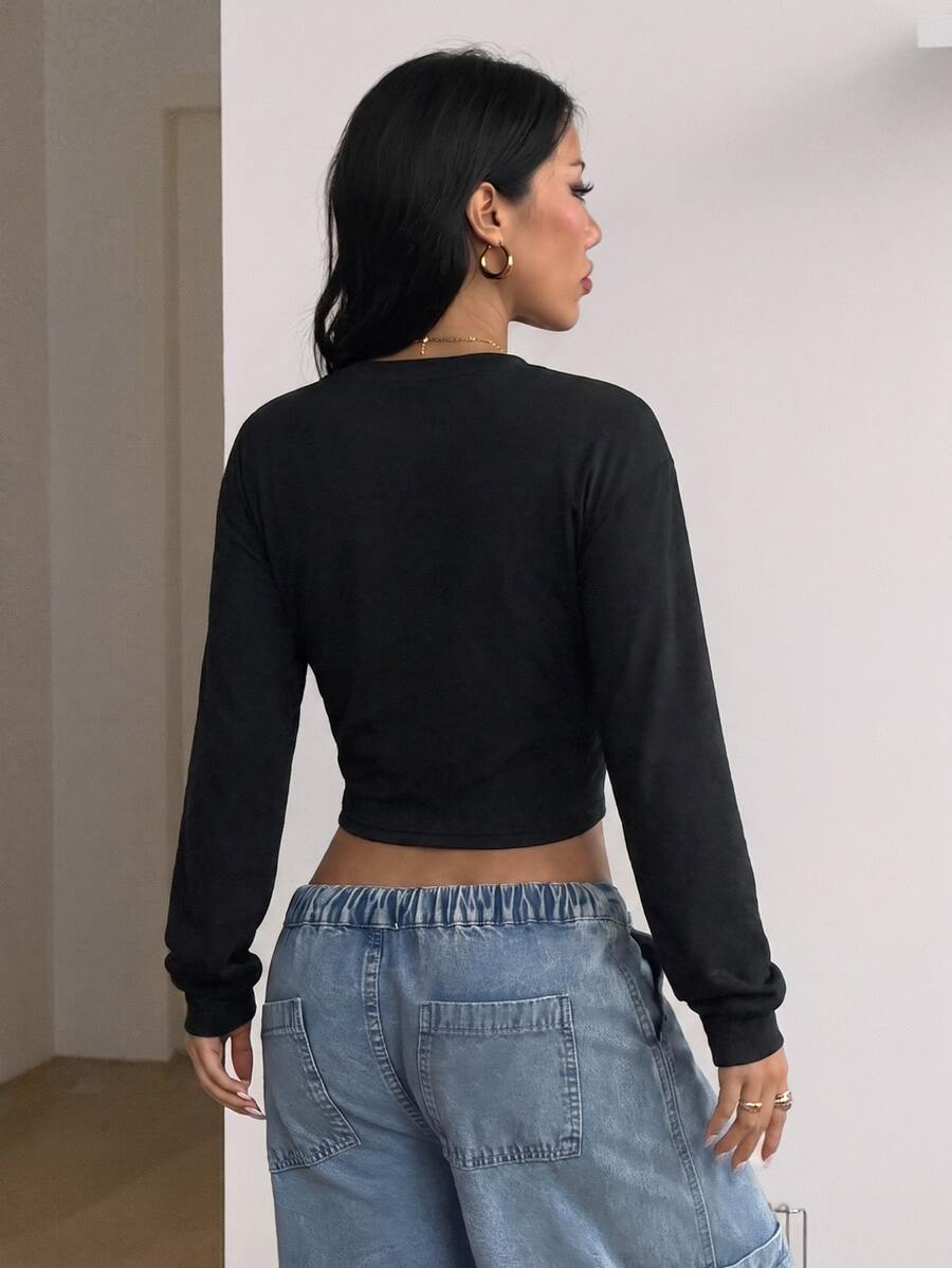 Women's brown waist-cinching sweatshirt featuring a round neck, drop shoulder long sleeves, and rib-knit cuffs.