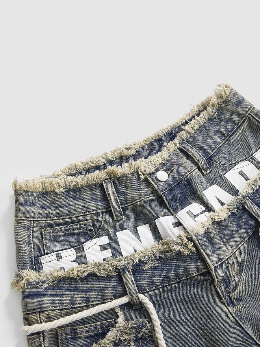 Women's blue denim bermuda shorts featuring a double waistband, star patch detail, ripped accents, and zipper fly closure.