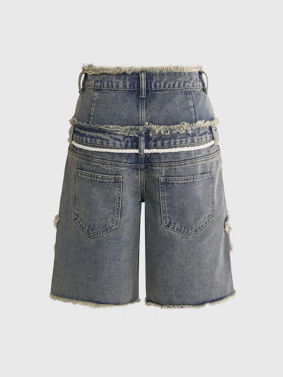 Women's blue denim bermuda shorts featuring a double waistband, star patch detail, ripped accents, and zipper fly closure.