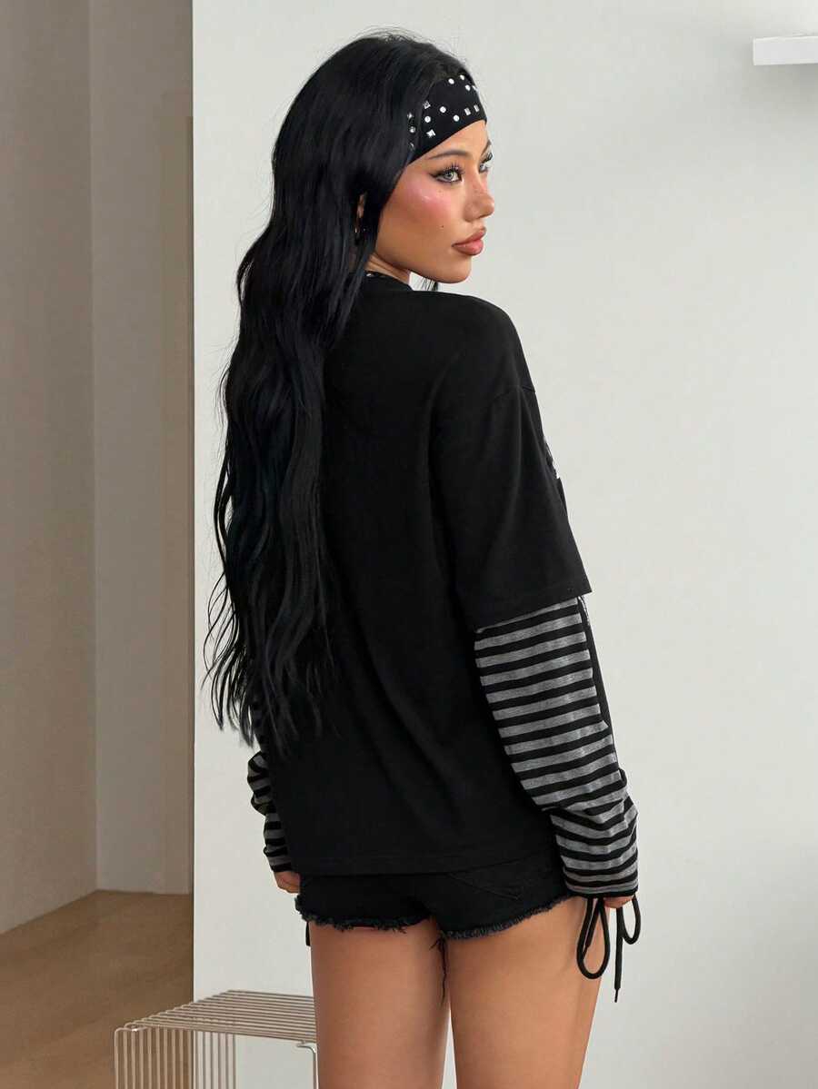 Women's casual graphic long sleeve t-shirt with a round neck, drop shoulder sleeves, and loose relaxed fit.